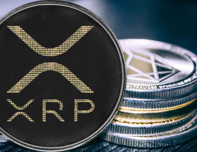 سعر XRP يصل إلى الدعم: هل سيحفز انعكاس السوق؟